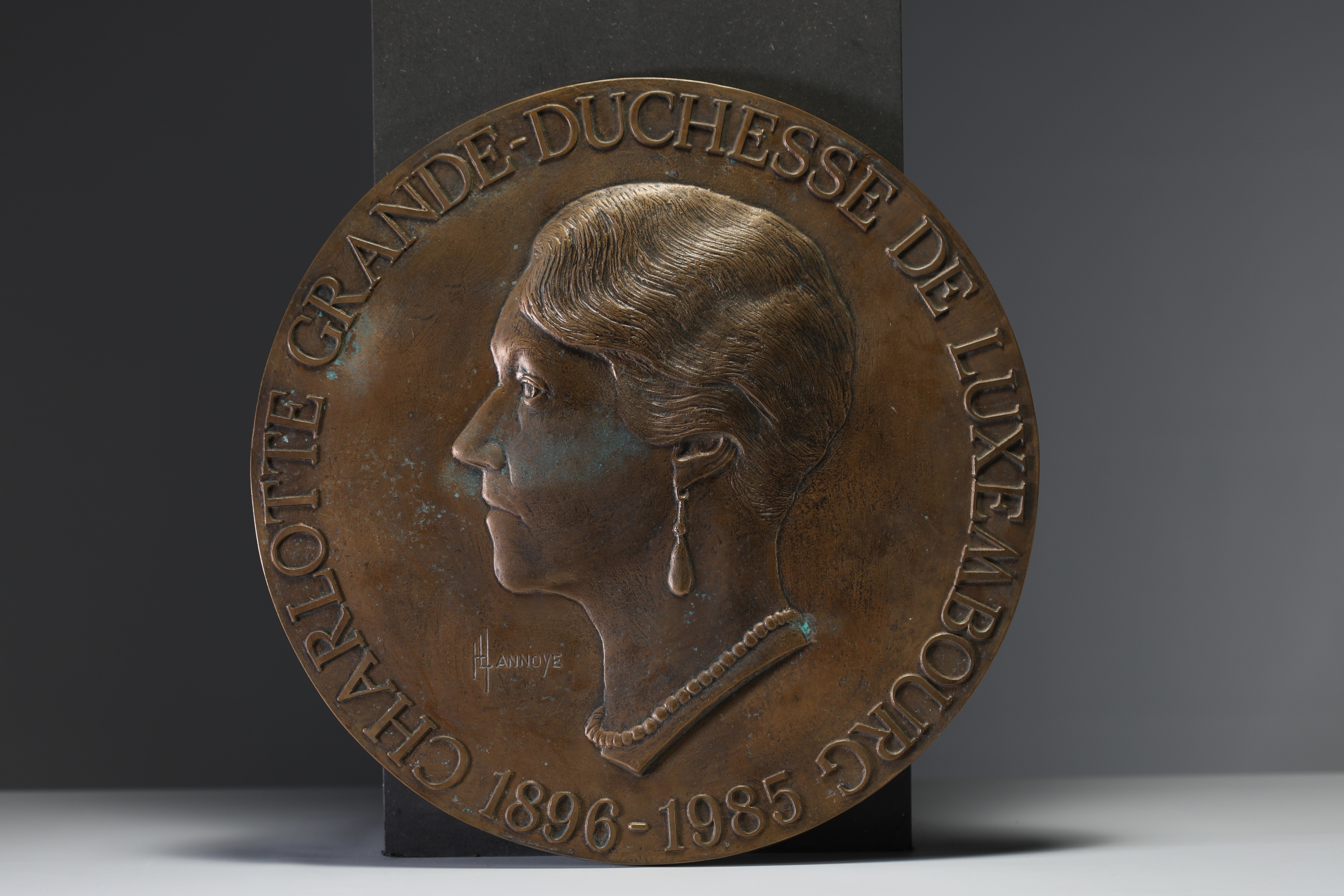 Artwork by Henri Lannoye, Henri (Hendrik) LANNOYE (1946-2006) ‘Profile of Grand Duchess Charlotte’ Bronze plaque, Made of bronze plaque