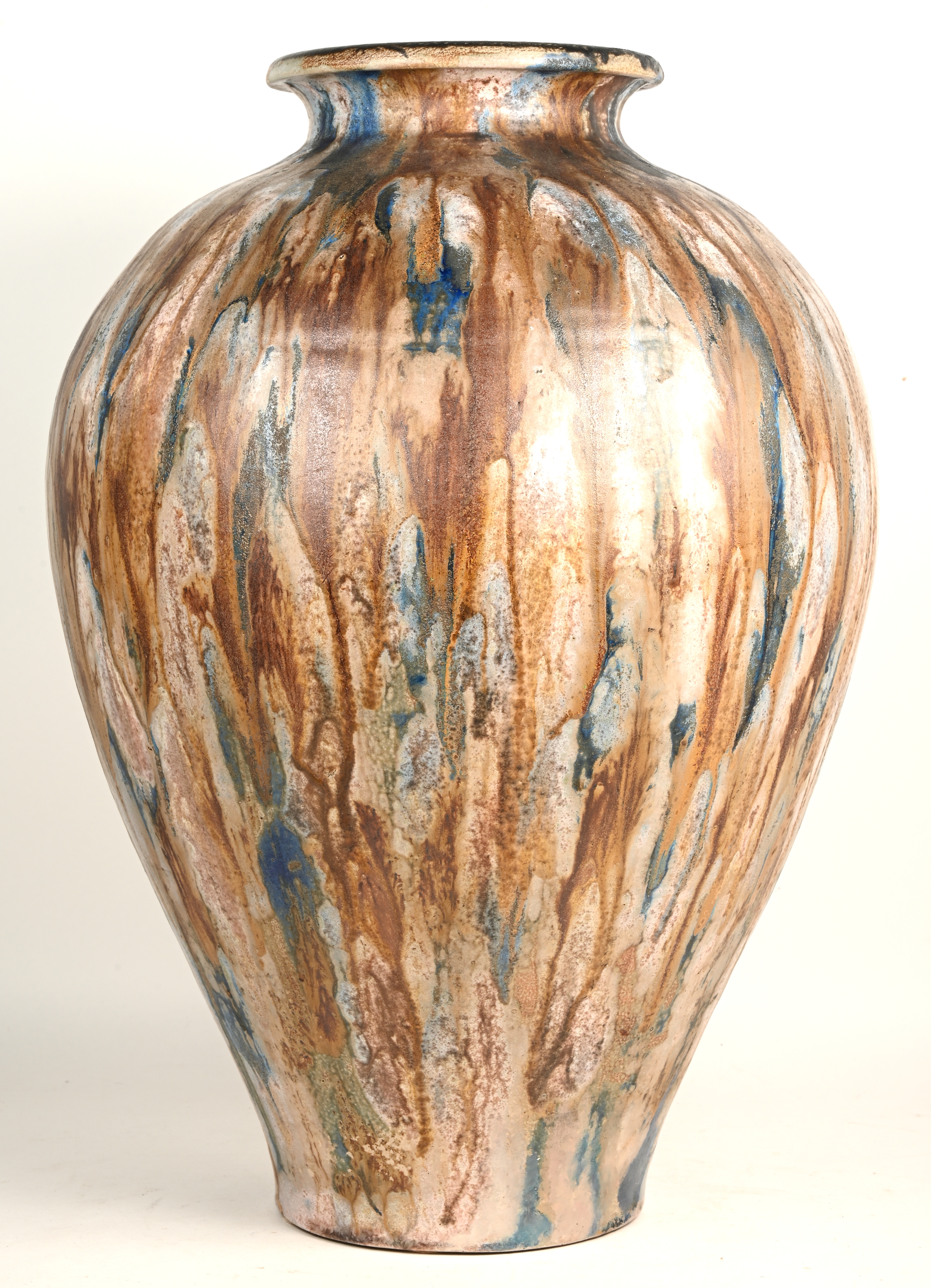 Artwork by Guérin, Een aardewerken bolle vaas met bruin en blauw glazuur, Made of brown and blue glaze