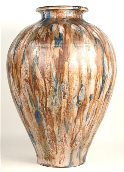 Een aardewerken bolle vaas met bruin en blauw glazuur by Guérin