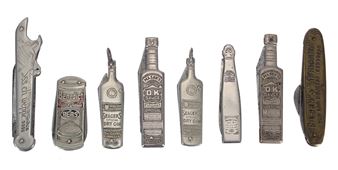 Eight novelty advertising knives, some modelled as branded bottles including Seager's Dry Gin - benedict