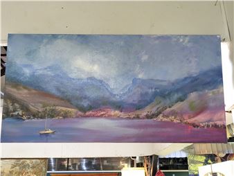 A watercolor landscape painting of a lake with mountains and a sailboat.