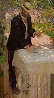A figure in a dark suit and hat stands at an outdoor table, reaching for items on a white cloth.