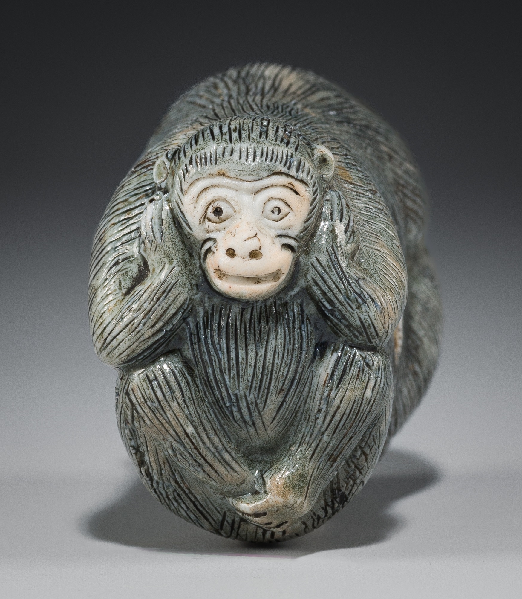 japanese-school-19th-century-a-large-porcelain-netsuke-of-kikazaru