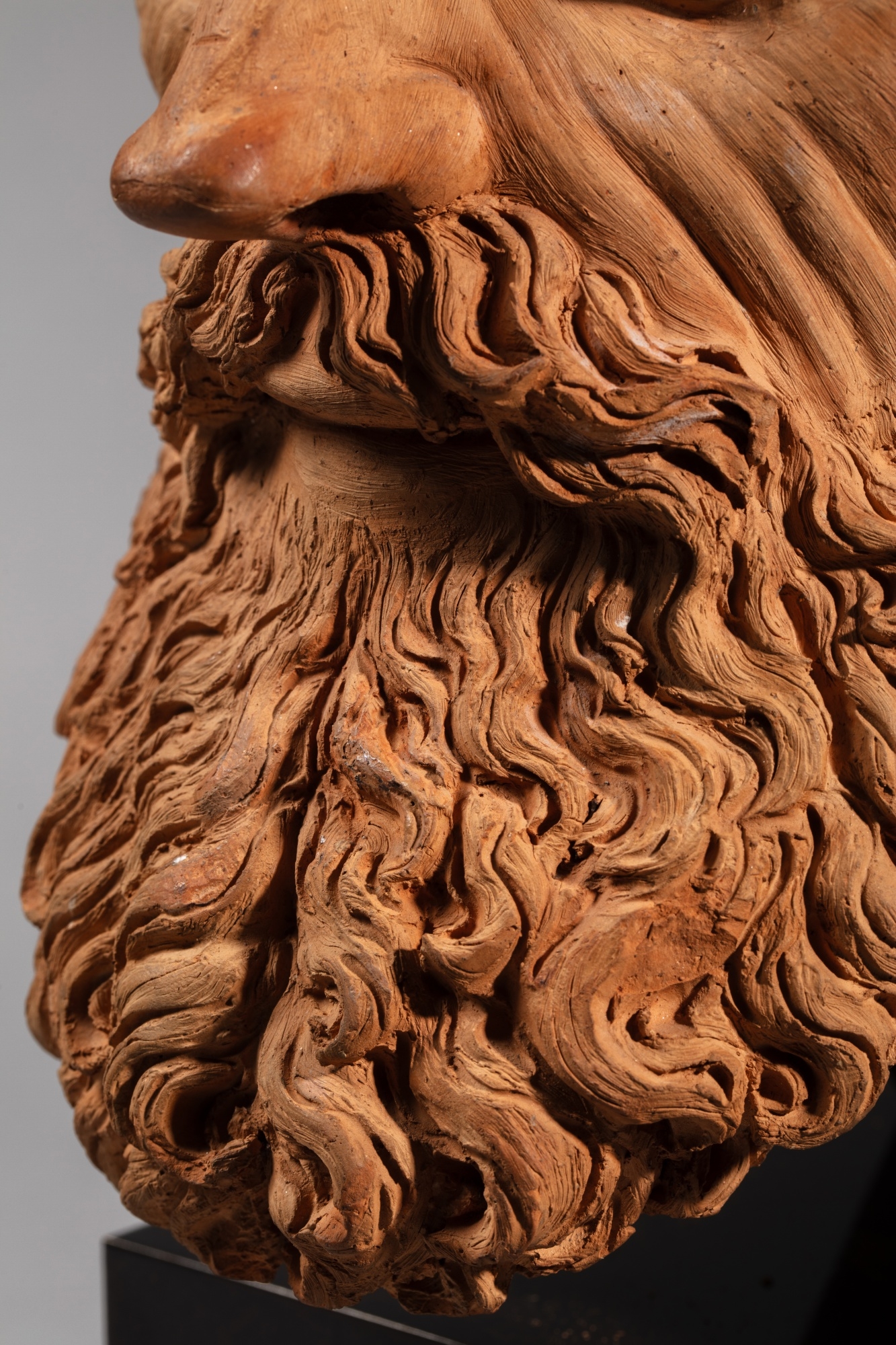 Artwork by Antonio Begarelli, Head of a Bishop, Made of terracotta on a modern metallic stand