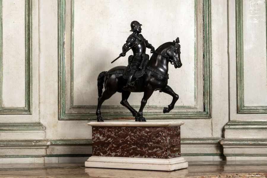 Artwork by Andrea del Verrocchio, after Equestrian statue of the Condotiere Bartolommeo Colleoni Proof in  with brown patina on a royal red marble base Italy, Made of bronze