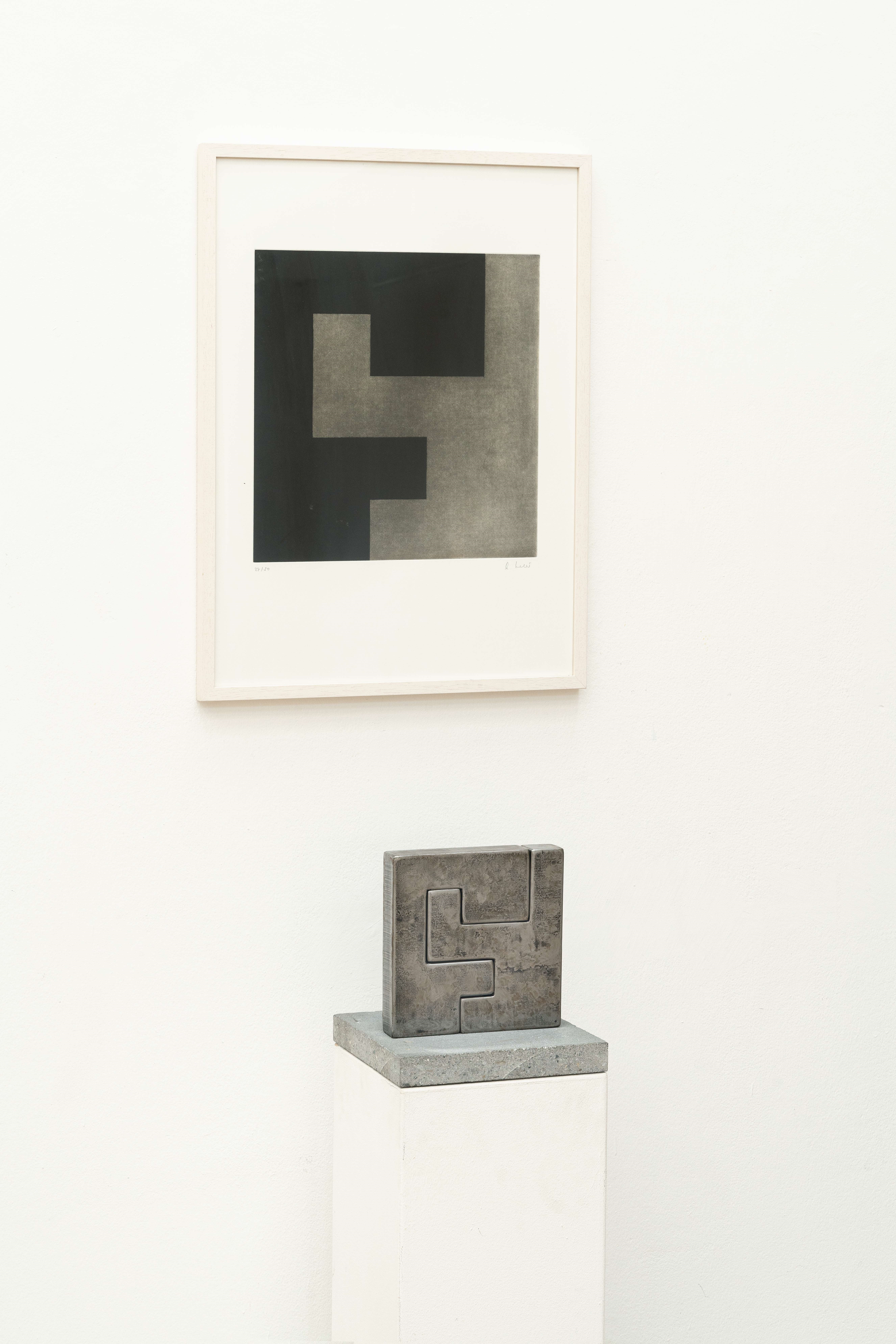 Artwork by Andrea Malär, Square (sculpture & graphics, Made of Steel, solid, on O. concrete base (2 parts). (2006). C. 25 x 25 x 5 cm (plinth ca. 30 x 30 x 4 cm). One of only 9 numbered copies. With stamped monogram on the underside of the steel body.
Enclosed: Idem, square. Etching with aquatint on wove by BFK Rives, 2006, approx. 45 x 44 cm (sheet c. 76.5 x 57.5 cm), one of 50 numbered copies, signed lower right.
Total of 2 works