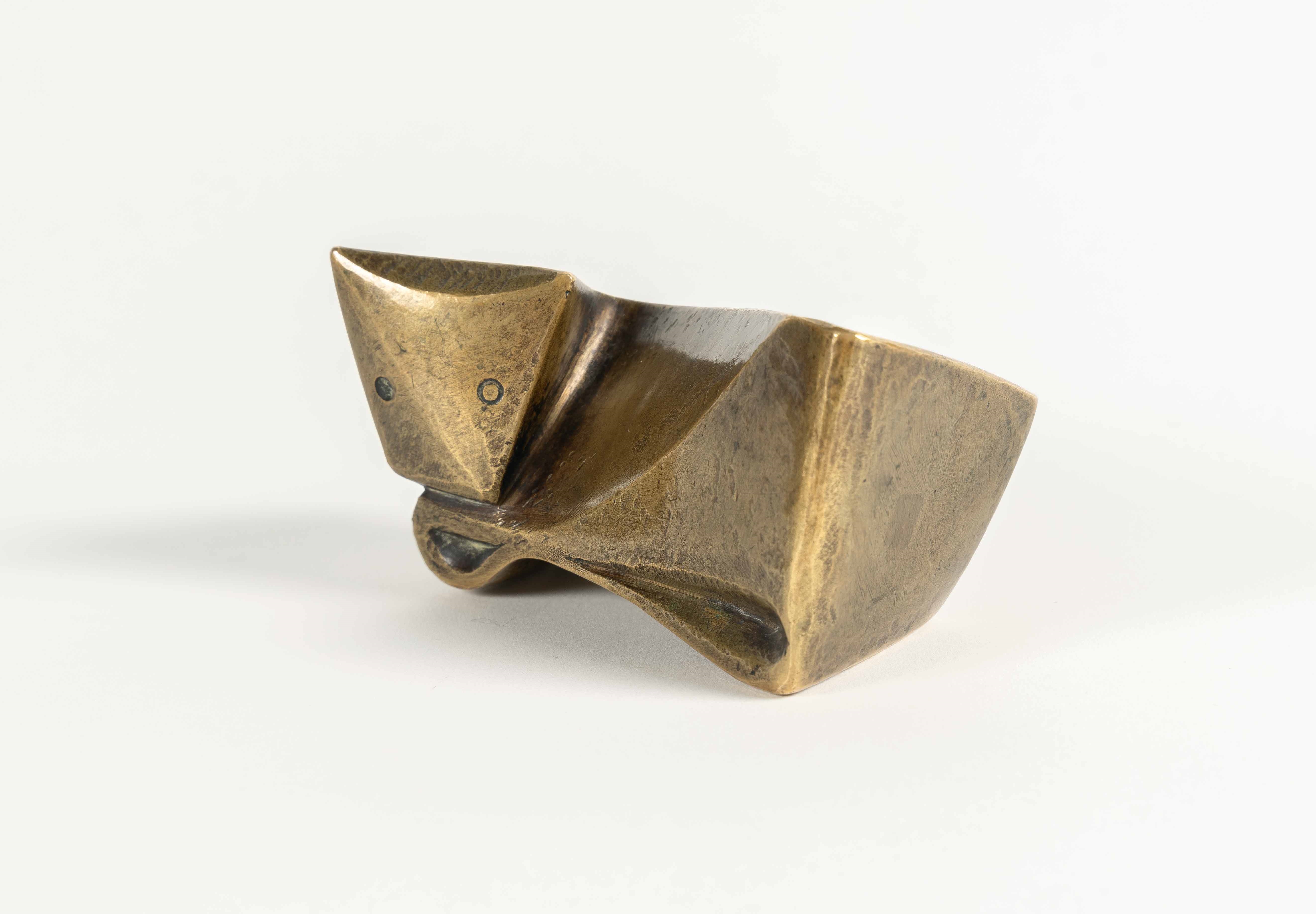 Artwork by Ewald Mataré, Sign of a cow I, Made of Bronze with golden yellow patina. (1946). C. 5 x 9 x 5.5 cm. One of a total of 8 casts. Signed with the artist’s monogrammed stamp on the base