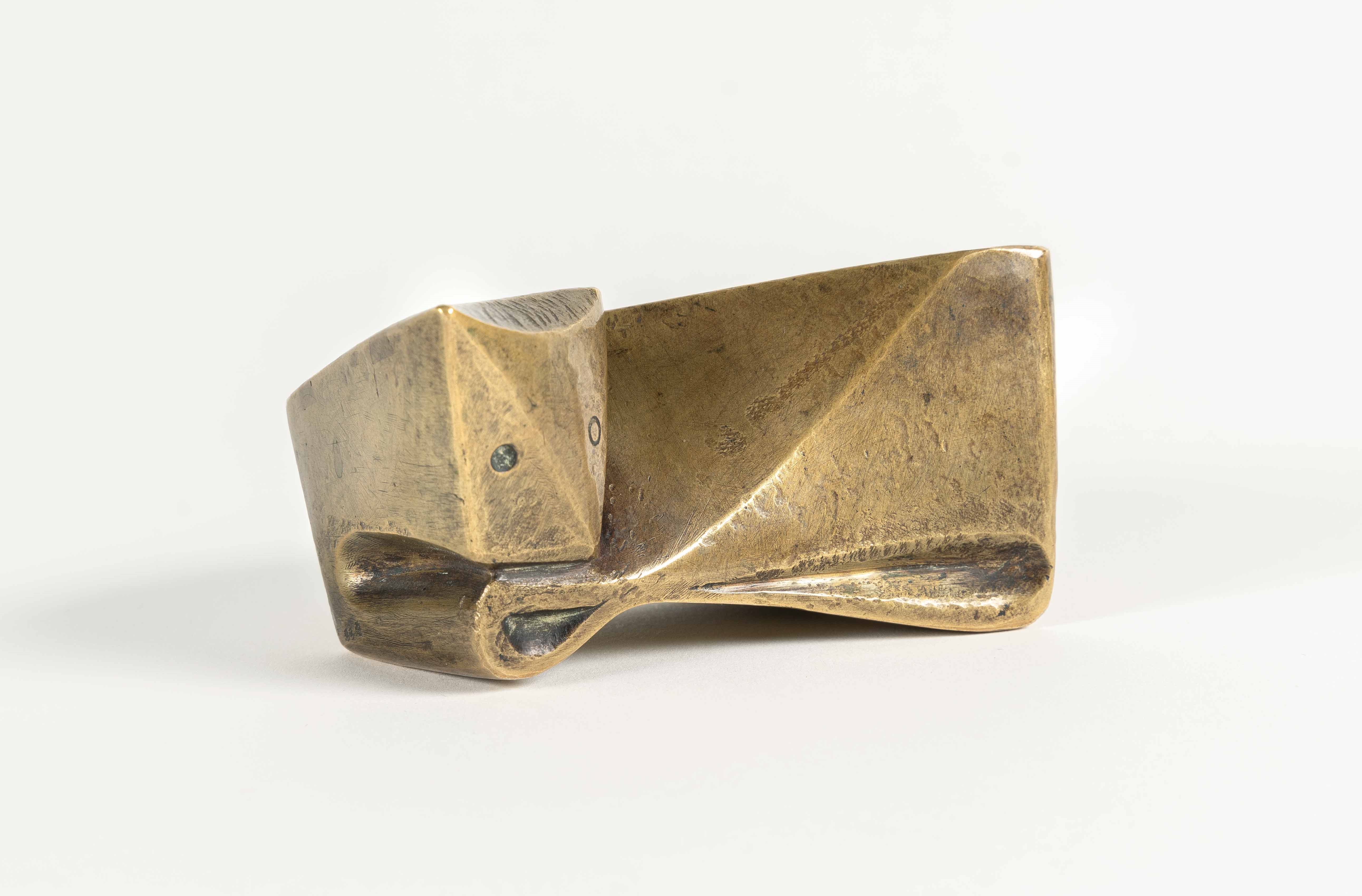 Artwork by Ewald Mataré, Sign of a cow I, Made of Bronze with golden yellow patina. (1946). C. 5 x 9 x 5.5 cm. One of a total of 8 casts. Signed with the artist’s monogrammed stamp on the base