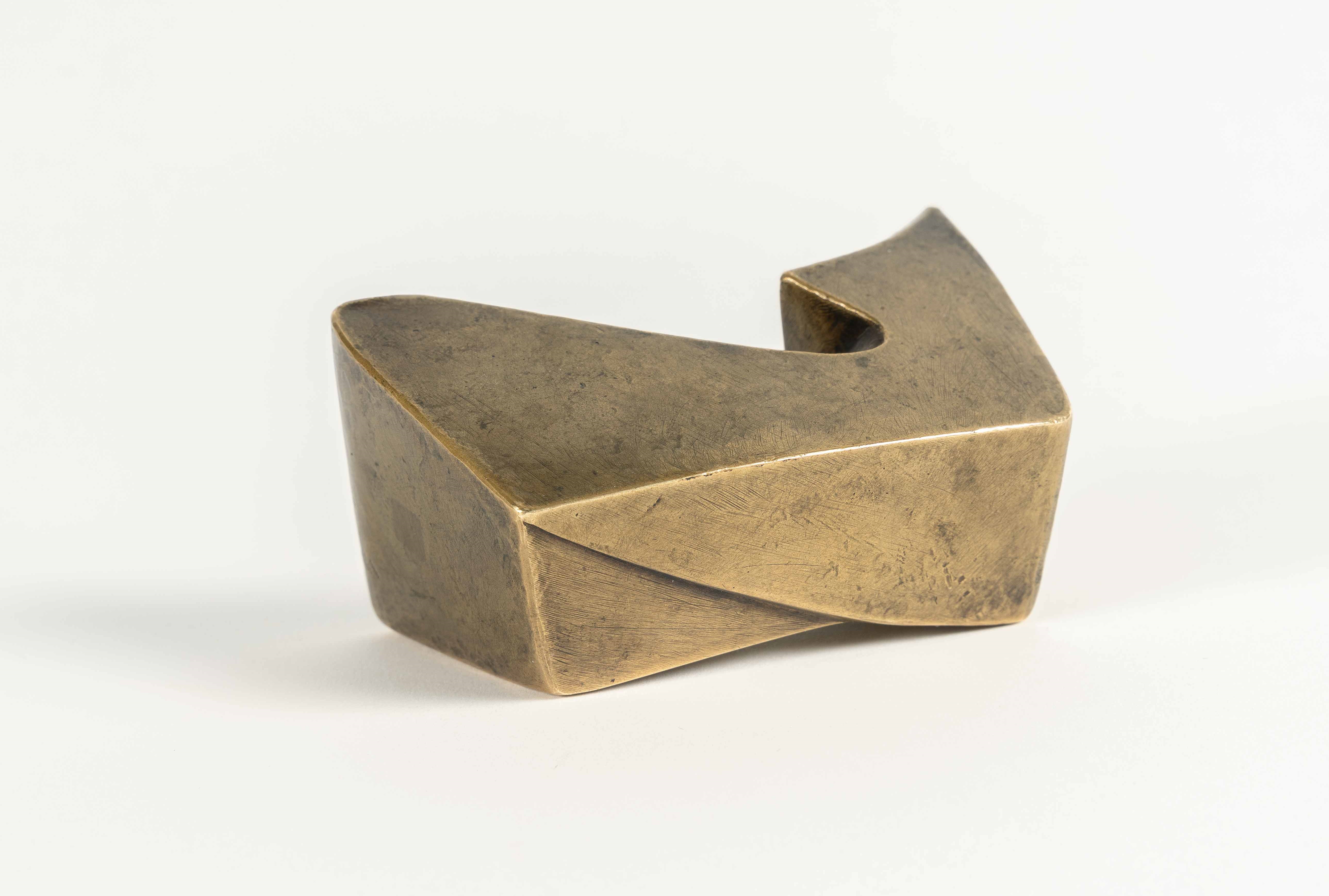 Artwork by Ewald Mataré, Sign of a cow I, Made of Bronze with golden yellow patina. (1946). C. 5 x 9 x 5.5 cm. One of a total of 8 casts. Signed with the artist’s monogrammed stamp on the base