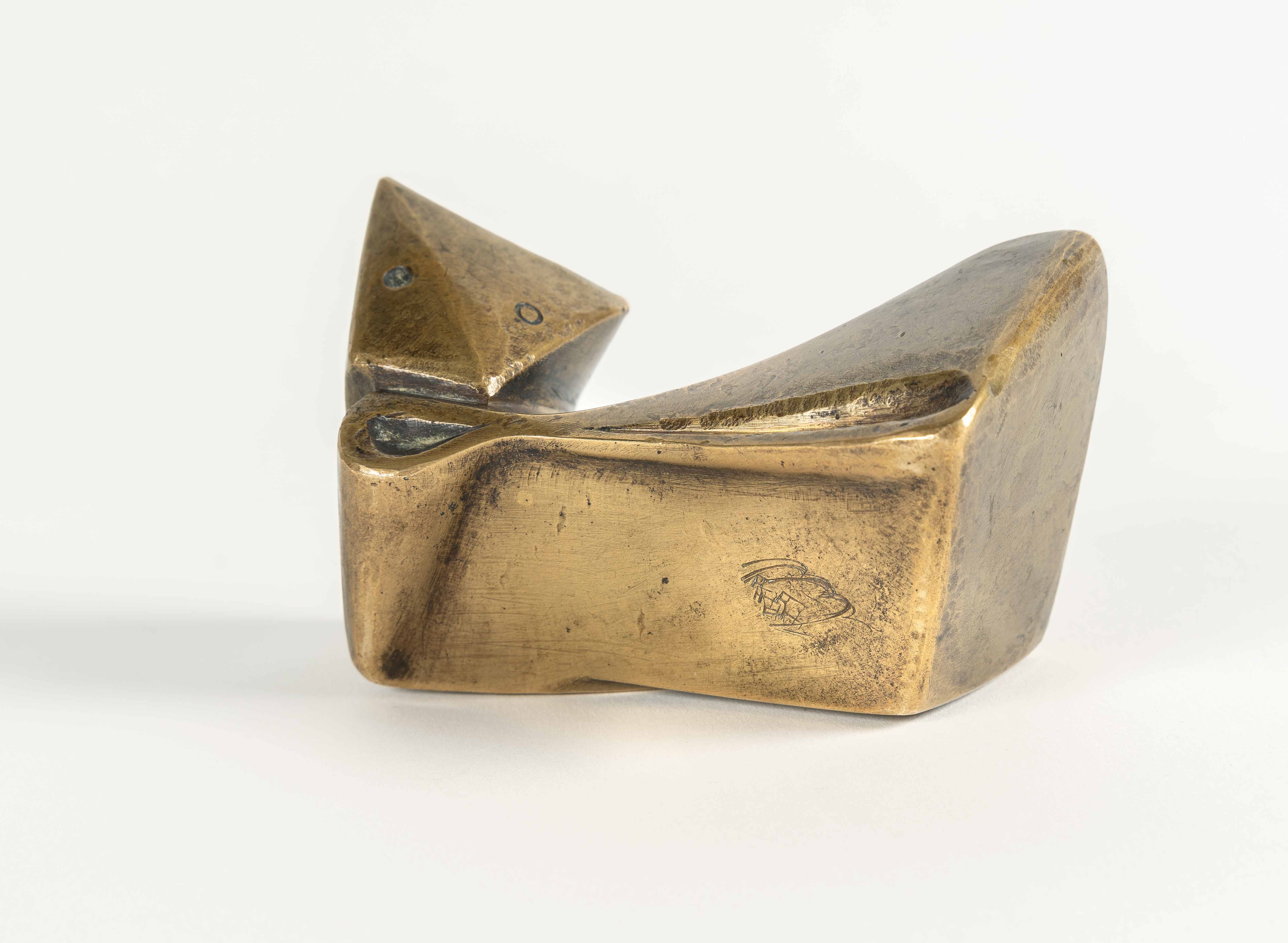 Artwork by Ewald Mataré, Sign of a cow I, Made of Bronze with golden yellow patina. (1946). C. 5 x 9 x 5.5 cm. One of a total of 8 casts. Signed with the artist’s monogrammed stamp on the base