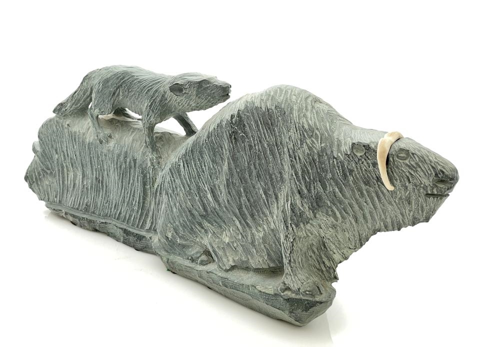 Artwork by Cain Iqqraqsaq, CAIN IQQRASA INUIT MUSKOX WOLF HAND CARVED SOAPSTONE SCULPTURE, Made of carved soapstone
