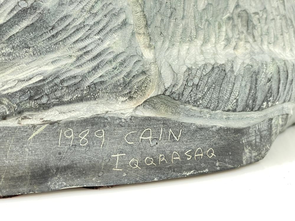 Artwork by Cain Iqqraqsaq, CAIN IQQRASA INUIT MUSKOX WOLF HAND CARVED SOAPSTONE SCULPTURE, Made of carved soapstone