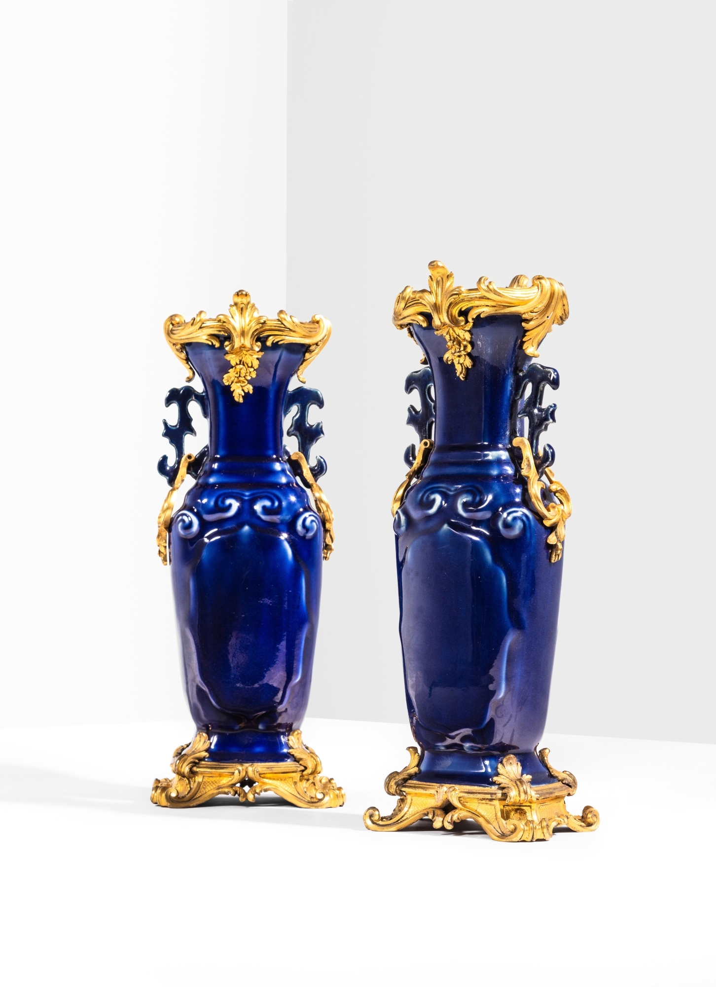 Artwork by Jean-Claude Chambellan Duplessis, A pair of Louis XV Chinese vases, Made of gilt-bronze mounted powder-blue chinese porcelain