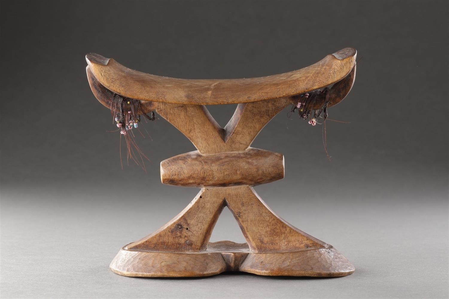 Artwork by Edric van Vredenburgh, A GOOD 'OLD DRY' SOUTH AFRICAN HEADREST, SHONA/TSONGA TRIBE, Made of glass