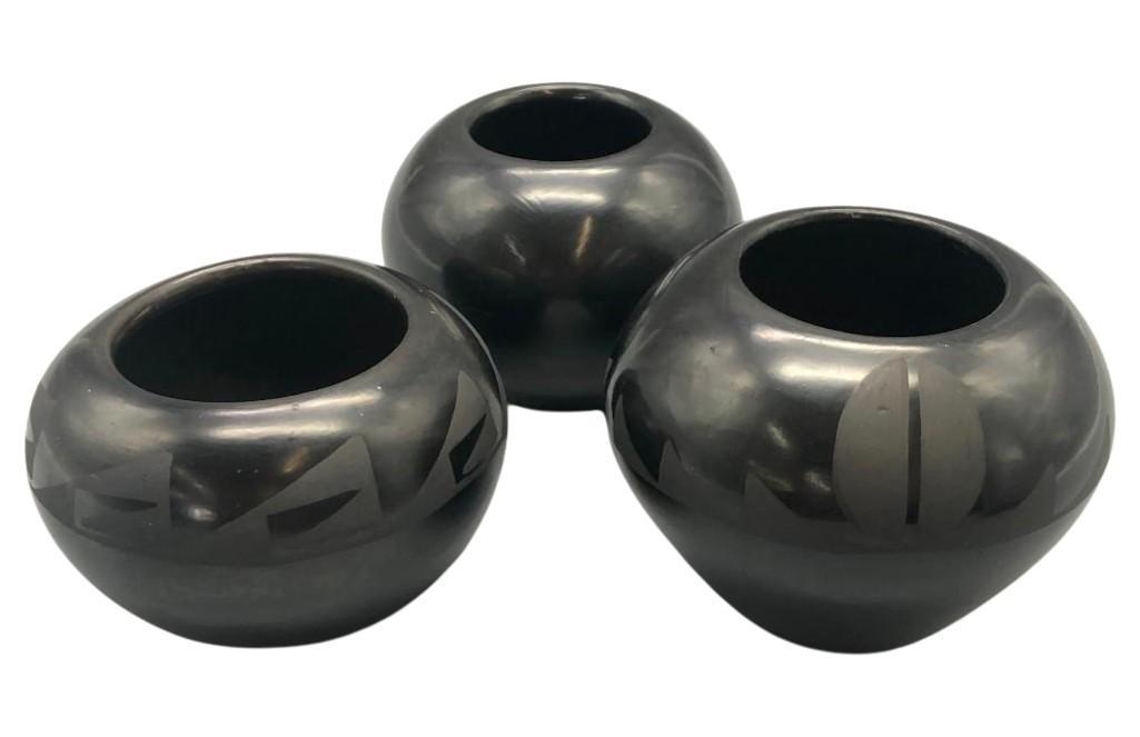 Artwork by Santana Roybal Martinez, Lot Of Three Adam And Santana Martinez San Ildefonso Pots, Made of black on black pottery