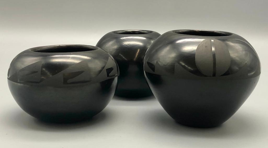 Artwork by Santana Roybal Martinez, Lot Of Three Adam And Santana Martinez San Ildefonso Pots, Made of black on black pottery
