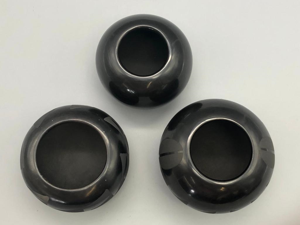 Artwork by Santana Roybal Martinez, Lot Of Three Adam And Santana Martinez San Ildefonso Pots, Made of black on black pottery