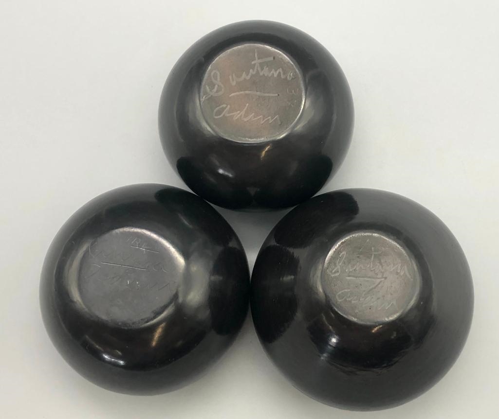 Artwork by Santana Roybal Martinez, Lot Of Three Adam And Santana Martinez San Ildefonso Pots, Made of black on black pottery
