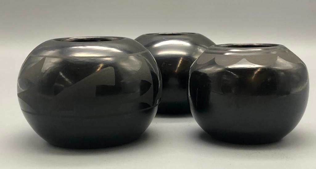 Artwork by Santana Roybal Martinez, Lot Of Three Adam And Santana Martinez San Ildefonso Pots, Made of black on black pottery