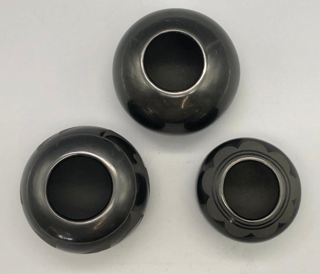 Artwork by Santana Roybal Martinez, Lot Of Three Adam And Santana Martinez San Ildefonso Pots, Made of black on black pottery