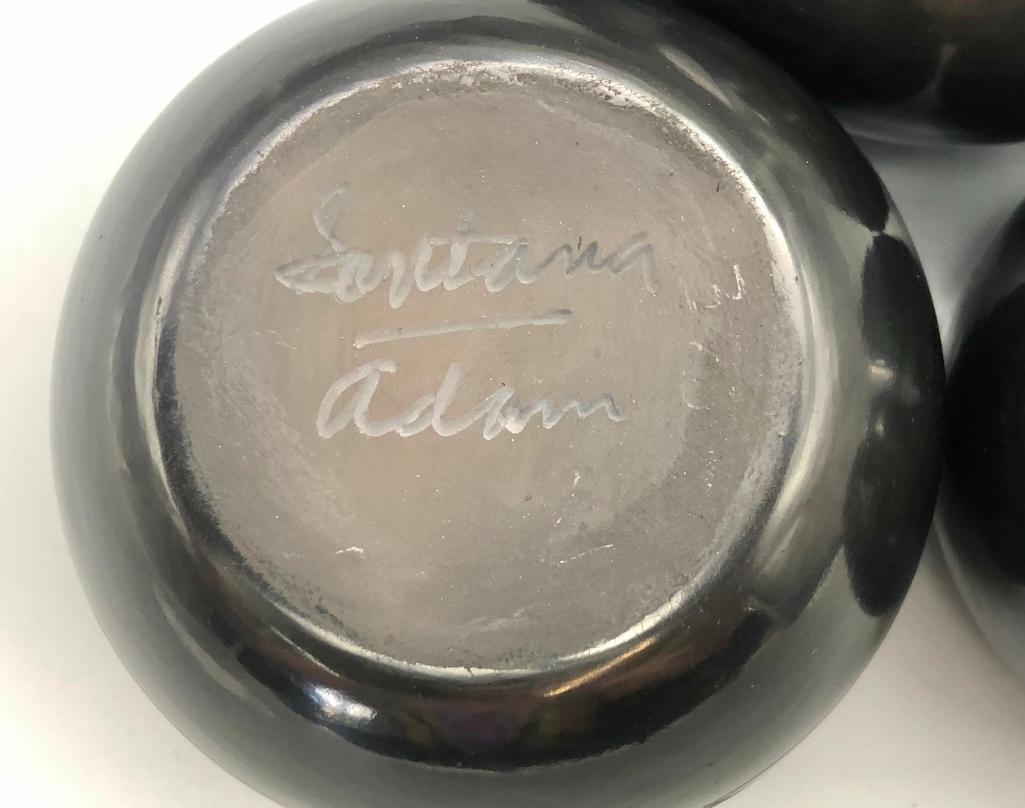 Artwork by Santana Roybal Martinez, Lot Of Three Adam And Santana Martinez San Ildefonso Pots, Made of black on black pottery