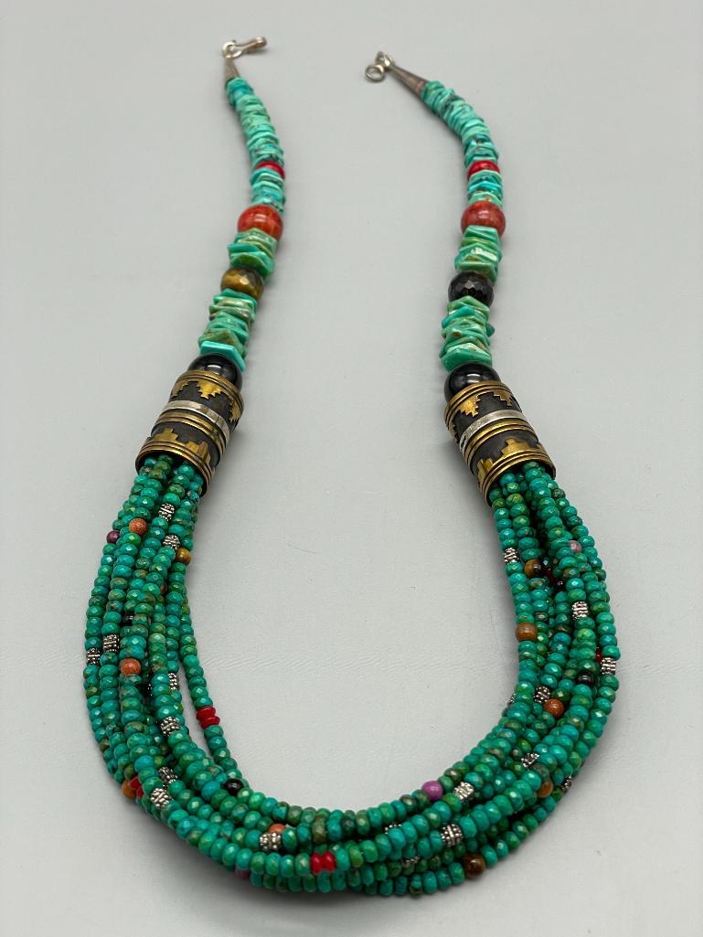 Artwork by Tommy Singer, Multi Stone And Multi Strand Tommy Singer Necklace, Made of turquoise, onyx