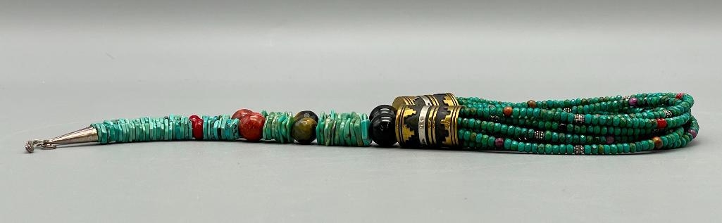 Artwork by Tommy Singer, Multi Stone And Multi Strand Tommy Singer Necklace, Made of turquoise, onyx