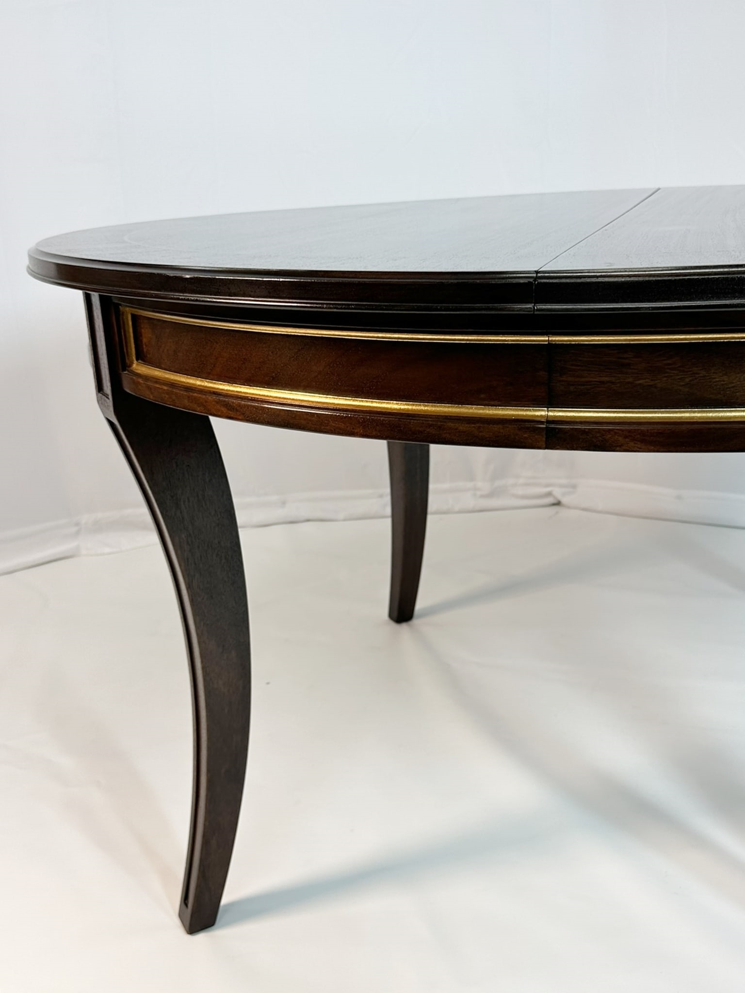 Artwork by Madeline Stuart, Talbot Dining Table With 22K Gold Gilding by Madeline Stuart, Made of mahogany and walnut wood