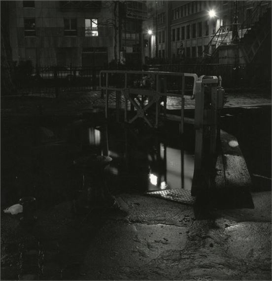 Lock on the canal. Paris, c. 1980. by Michel Cabaud, circa 1980
