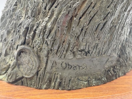 Artwork by A. J. Obara, A.J. Obara Jr. Bronze Eagle Head, Made of bronze eagle head sculpture mounted on a wood plaque