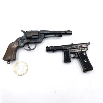 Calvin Hill'. Weight - 38 grams. And a Colt pistol marked 'Hong Kong - Calvin Hill