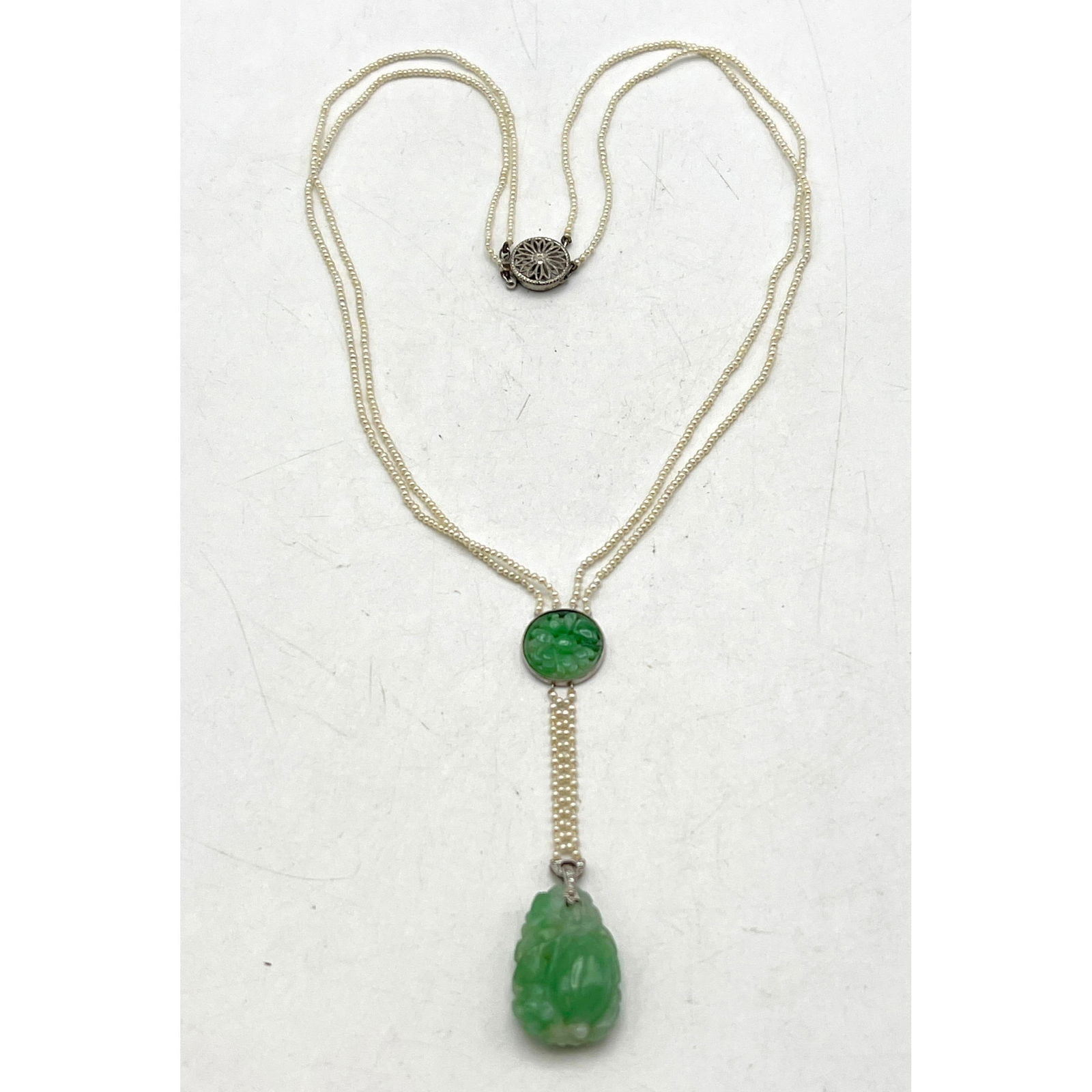 Artwork by Unknown , Antique Double Strand Seed Pearl, Carved Jade Necklace. Carved Jade Pendant and Bezel Set Carved Jad, Made of Carved Jade Pen