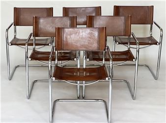 DINING ARMCHAIRS, a set of six cantilever chrome framed with hand finished natural tan leather upholstered seats after the design by Mart Stam - Mart Stam