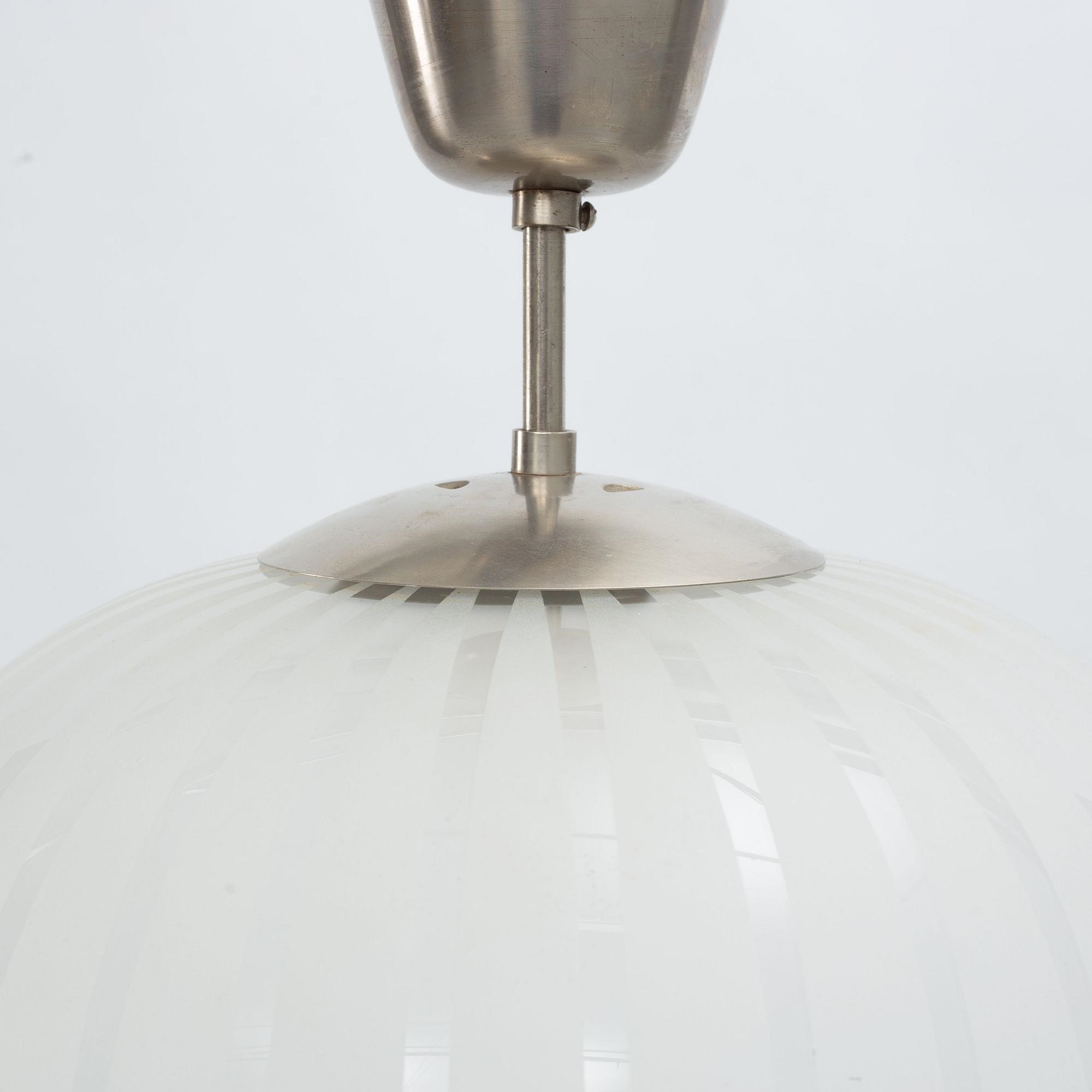 Artwork by Harald Notini, a ceiling lamp model "11259", Arvid Böhlmarks Lampfabrik, 1940s, Made of Wood and leather