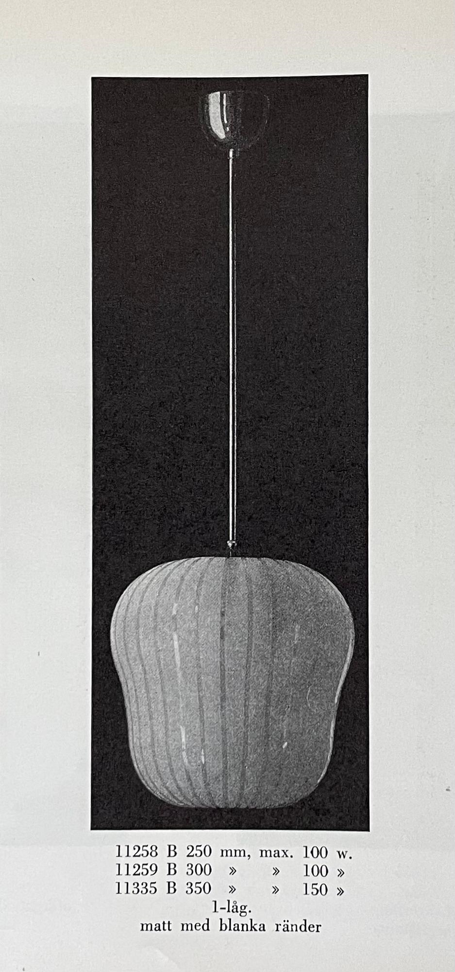 Artwork by Harald Notini, a ceiling lamp model "11259", Arvid Böhlmarks Lampfabrik, 1940s, Made of Wood and leather