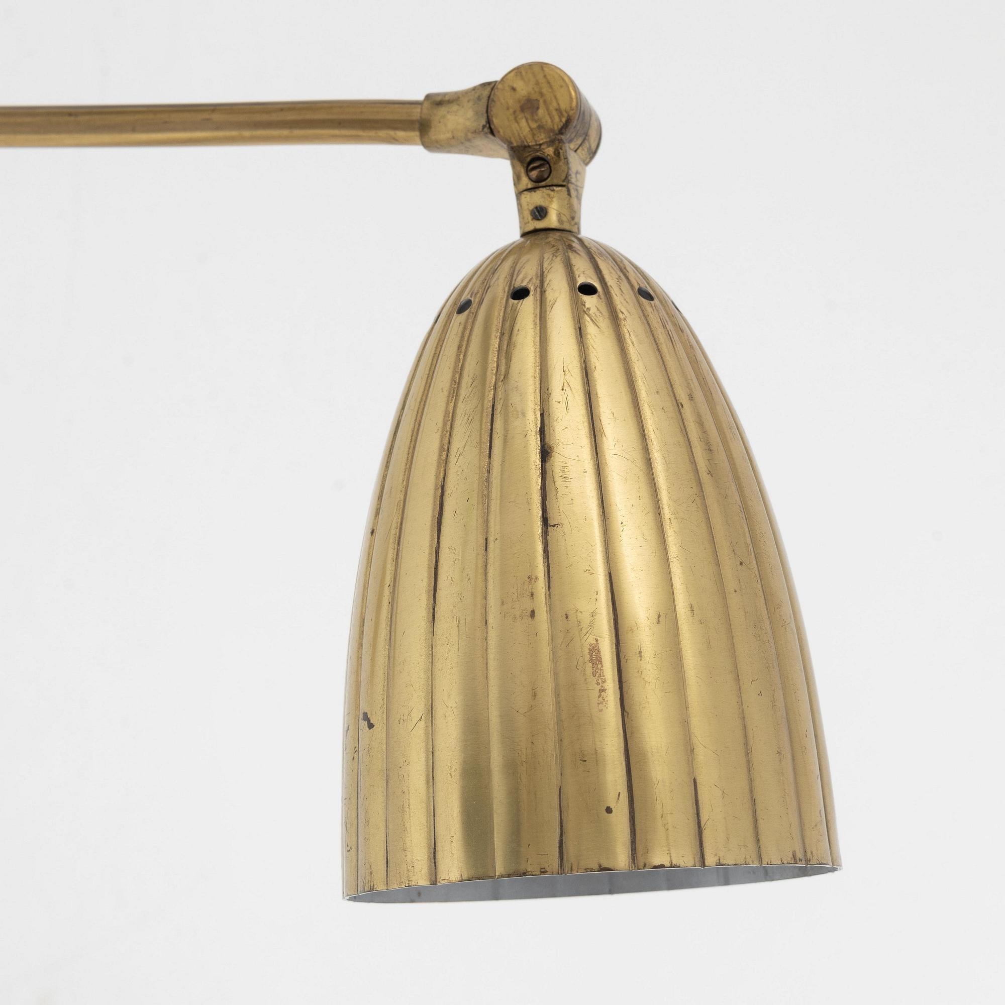 Artwork by Harald Notini, a model "8666" wall lamp, Arvid Böhlmarks Lampfabrik, Sweden, 1940's, Made of glass, wood and leather