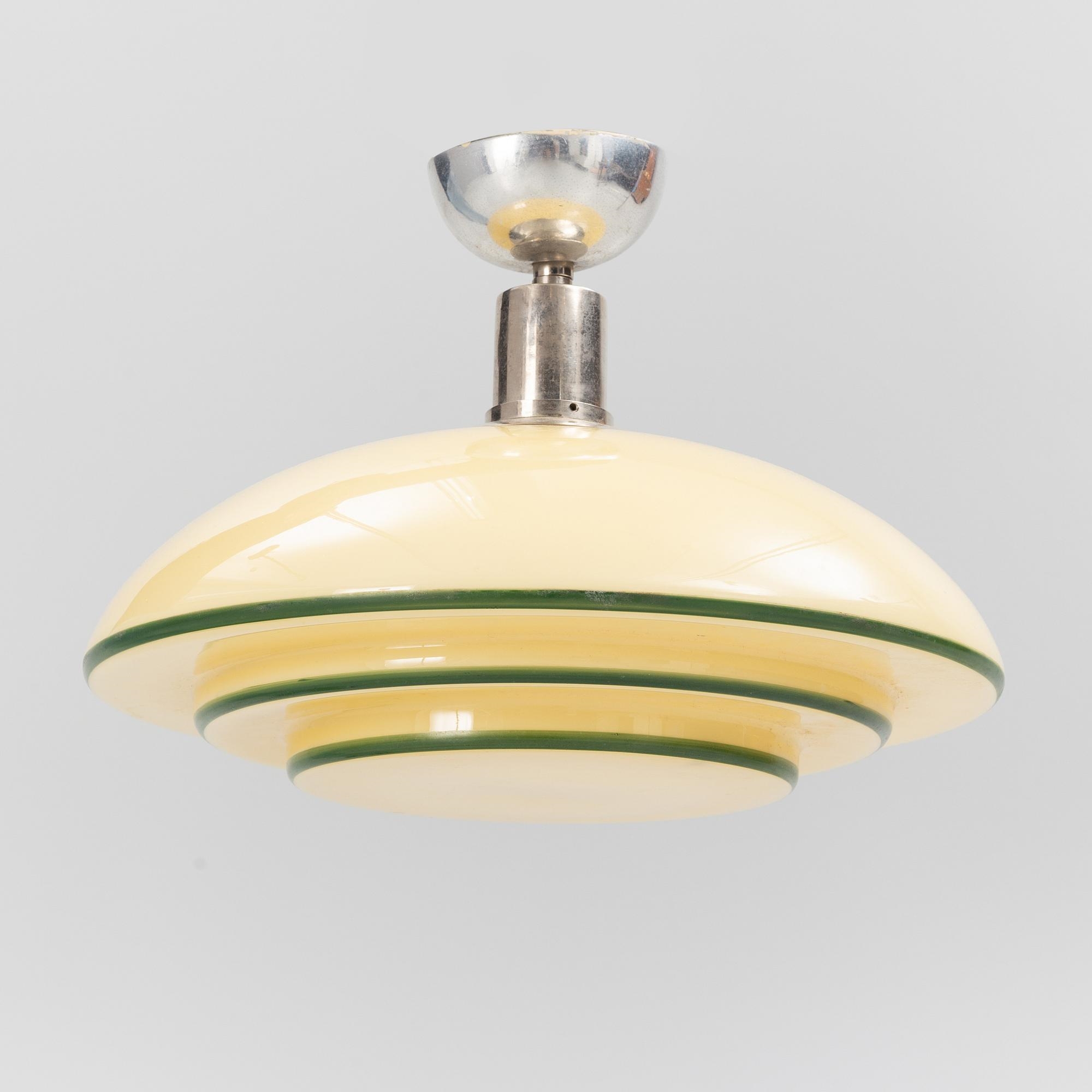 Artwork by Harald Notini, a ceiling lamp, model "10755", Arvid Böhlmarks Lamp Factory, 1930s, Made of opalescent glass with green lacquered