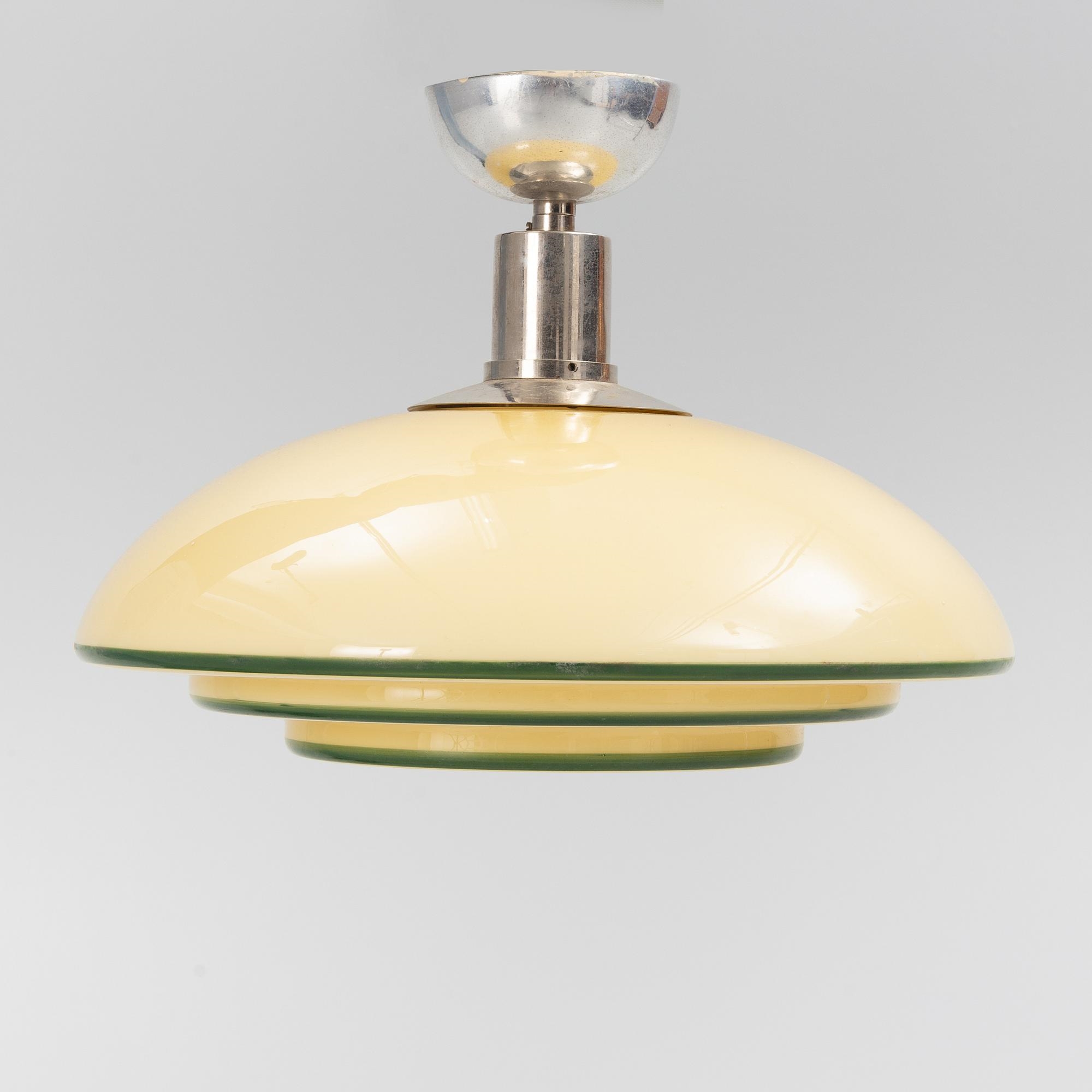 Artwork by Harald Notini, a ceiling lamp, model "10755", Arvid Böhlmarks Lamp Factory, 1930s, Made of opalescent glass with green lacquered