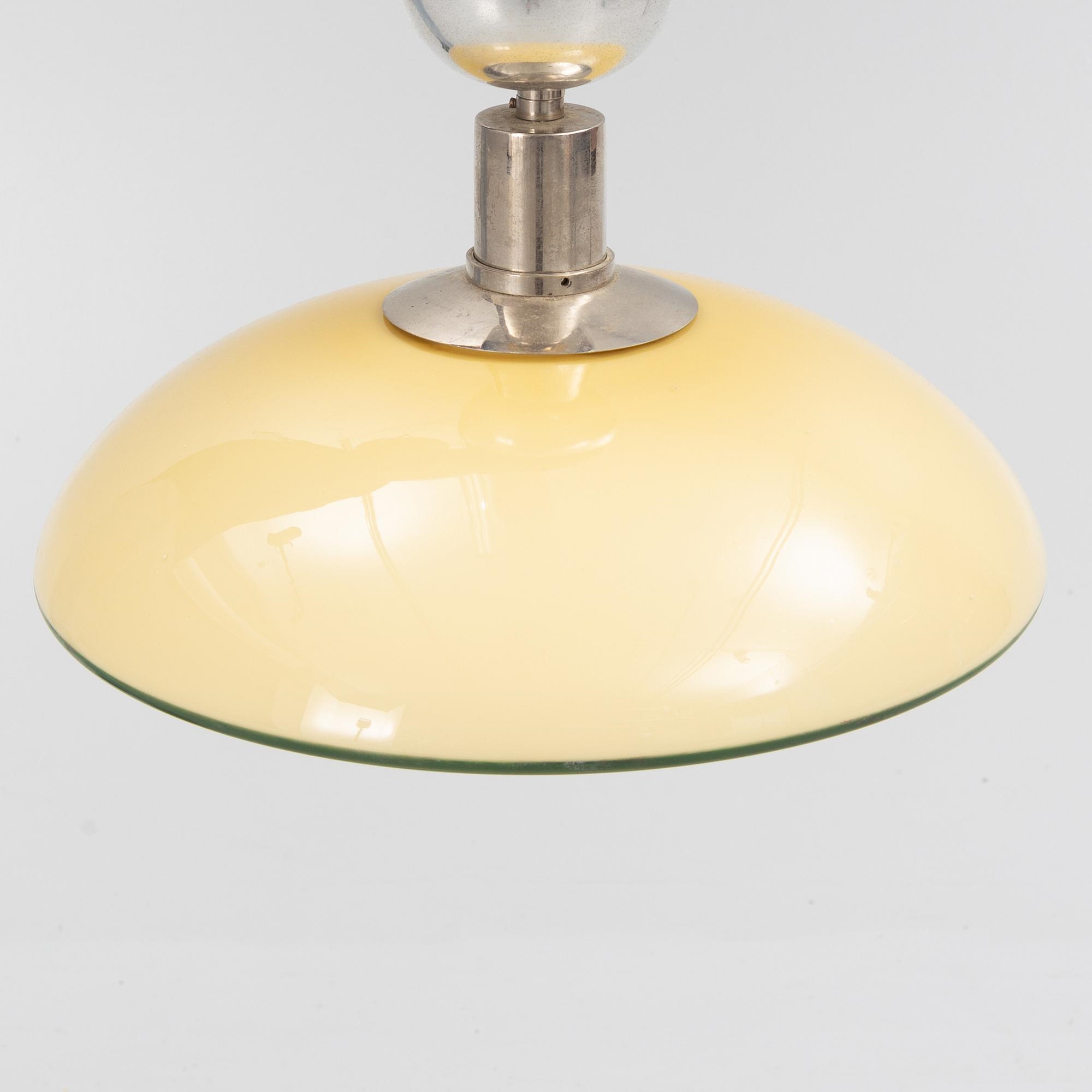 Artwork by Harald Notini, a ceiling lamp, model "10755", Arvid Böhlmarks Lamp Factory, 1930s, Made of opalescent glass with green lacquered
