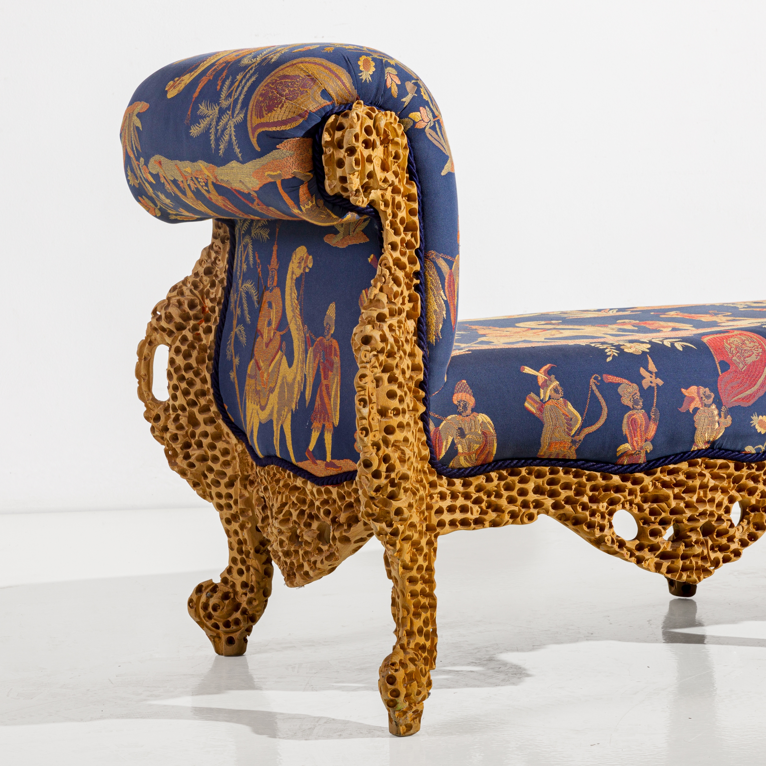 Artwork by Urano Palma, Panchetta. Legno massello scolpito e traforato e sabbiato, tessuto imbottito. Italia 1974 ca., Made of Legno