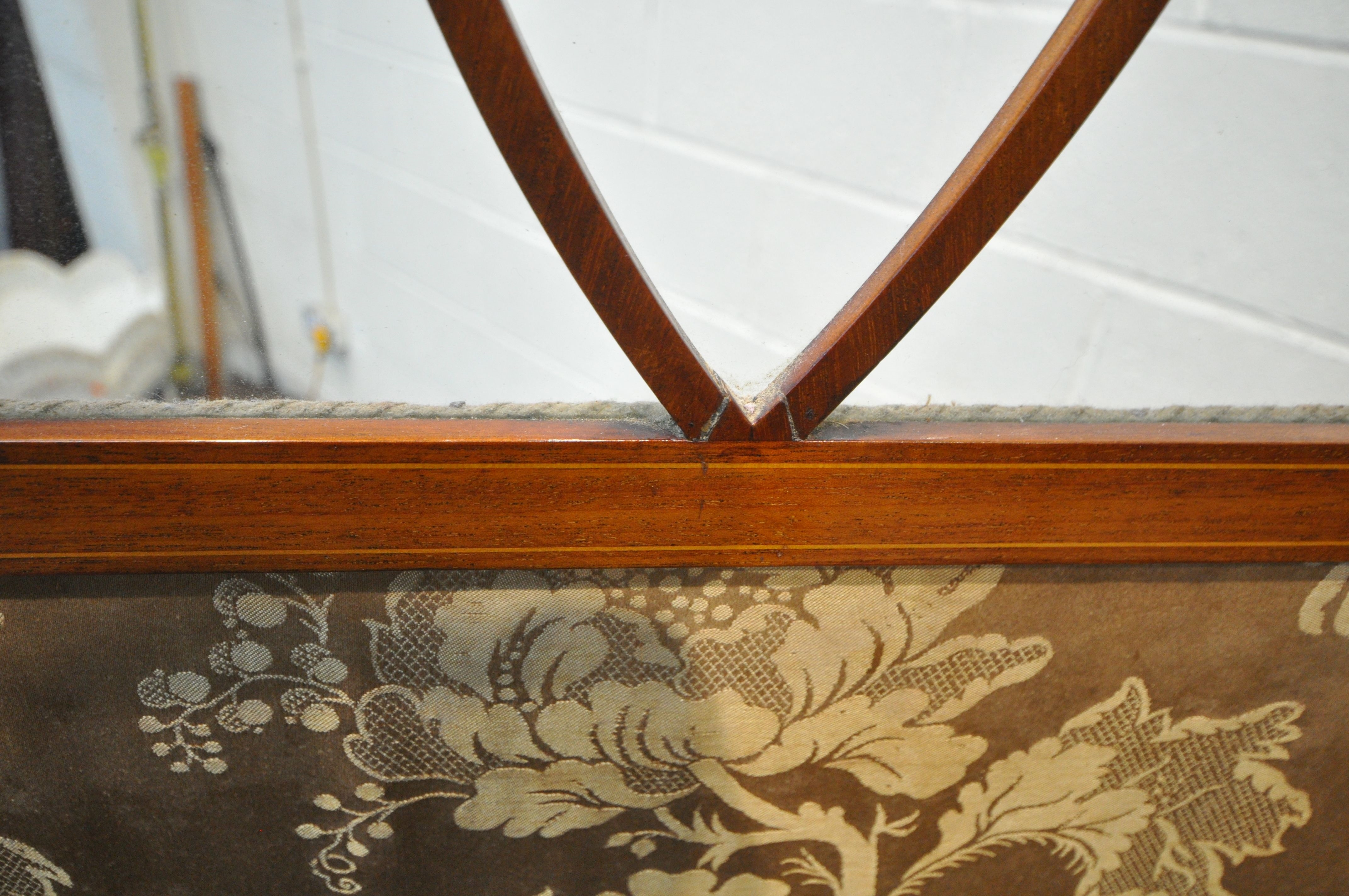 An Edwardian | AN EDWARDIAN MAHOGANY FOUR SECTION FOLDING SCREEN, with ...