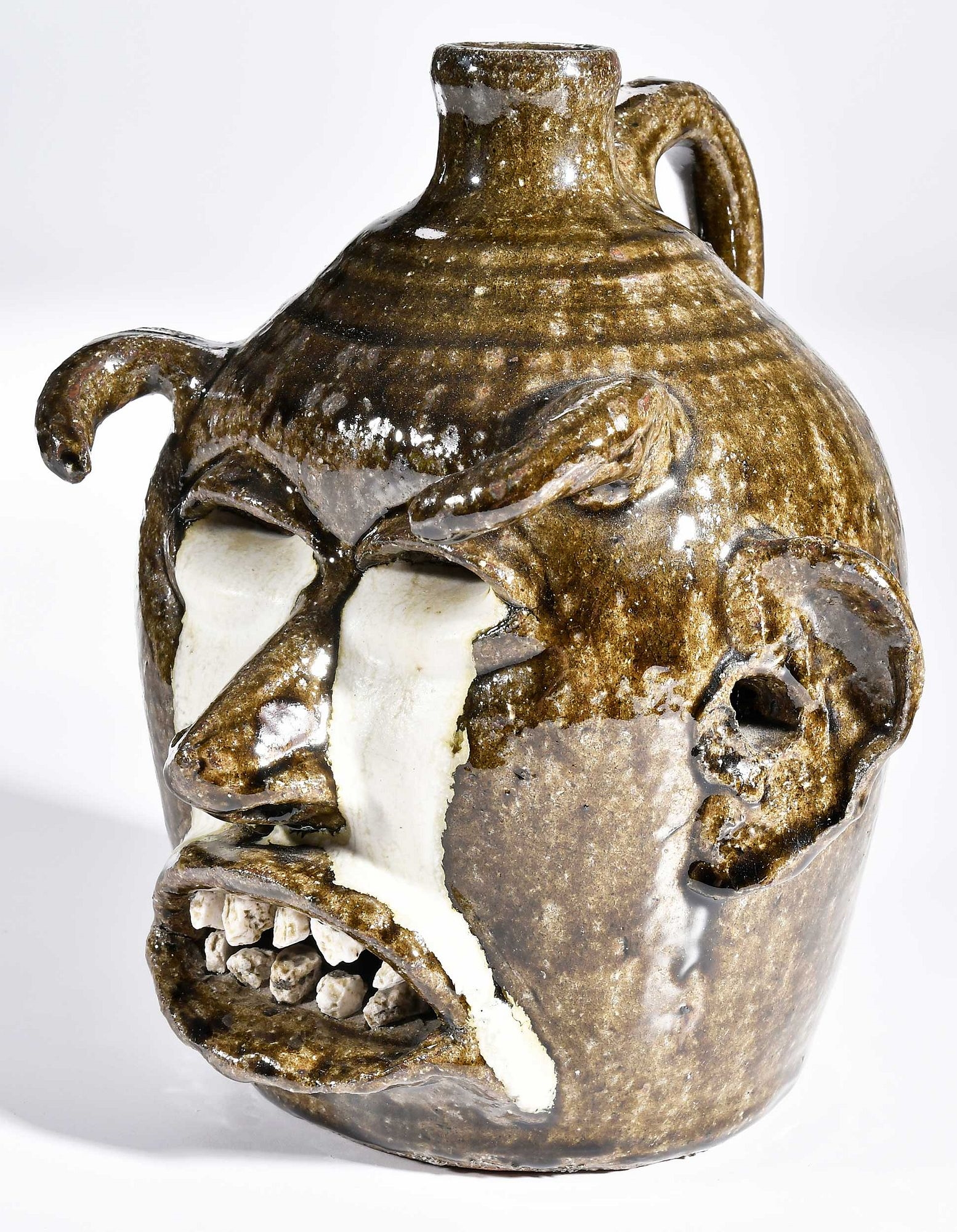 Artwork by Lanier Meaders, Rare and Important Lanier Meaders Devil Jack-O-Lantern Face Jug, Made of glaze