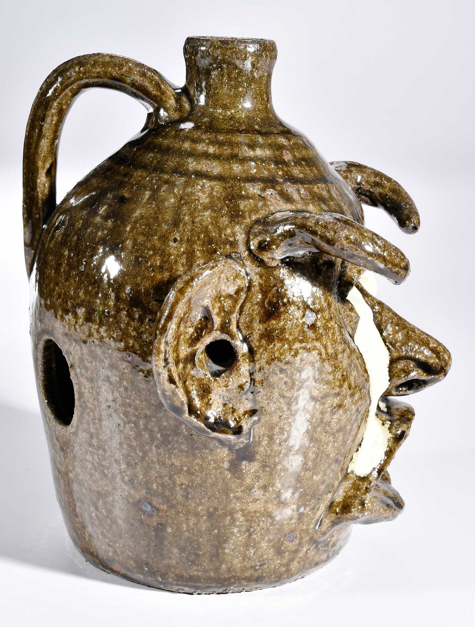 Artwork by Lanier Meaders, Rare and Important Lanier Meaders Devil Jack-O-Lantern Face Jug, Made of glaze