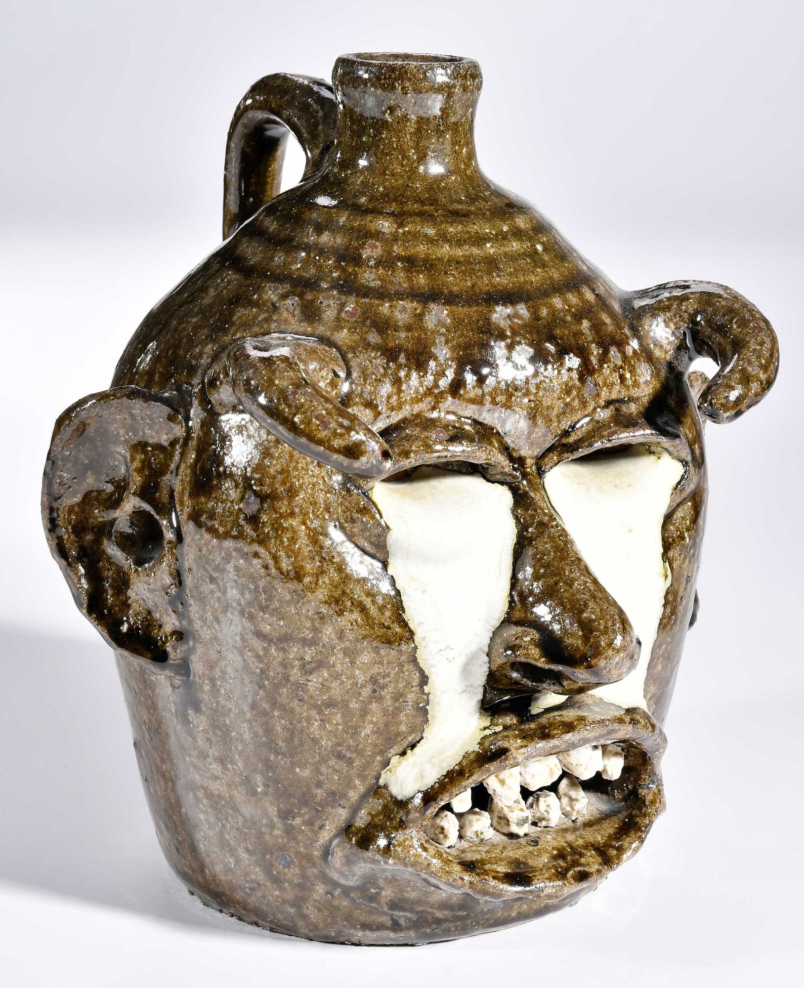 Artwork by Lanier Meaders, Rare and Important Lanier Meaders Devil Jack-O-Lantern Face Jug, Made of glaze