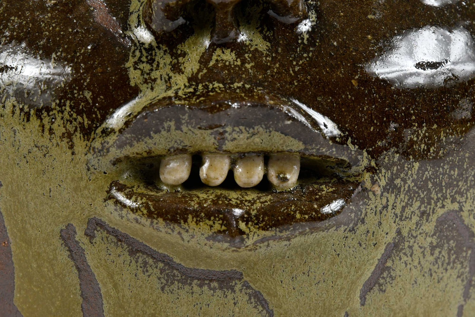 Artwork by Lanier Meaders, Lanier Meaders Double Face Candelabra Stoneware Jug, Made of Stoneware