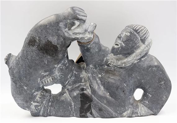 A hunter struggling with a seal - Jimmy Muckpah