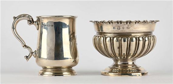 William Hutton & Sons | A silver tankard of baluster form with a scroll ...