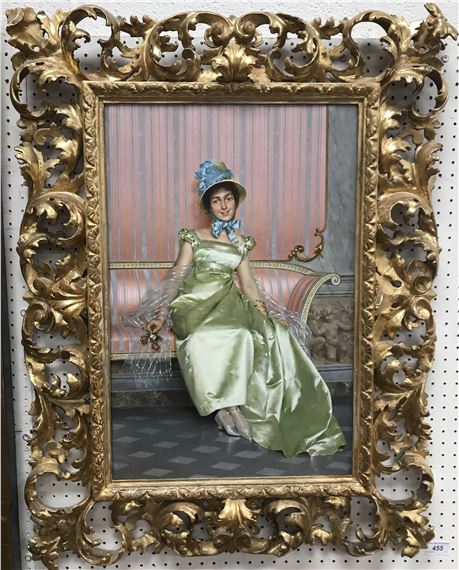 Vittorio Reggianini | VITTORIO REGGIANINI (1858-1938) Lady in lime silk  dress seated on a canape | MutualArt