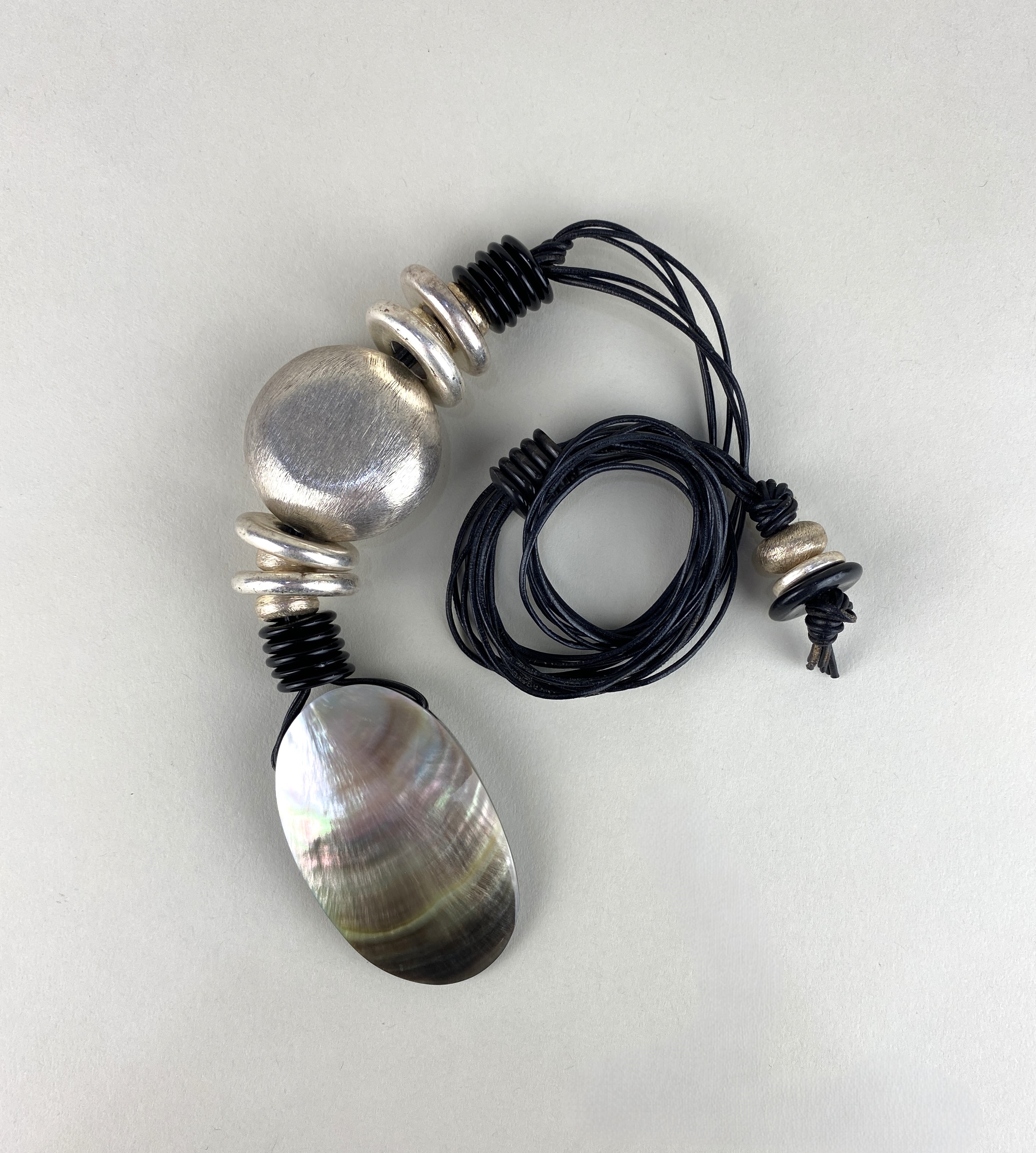 Artwork by Marilyn Arnold Palley, Marilyn Arnold Palley, Made of lacquered wood, and silver coloured metal