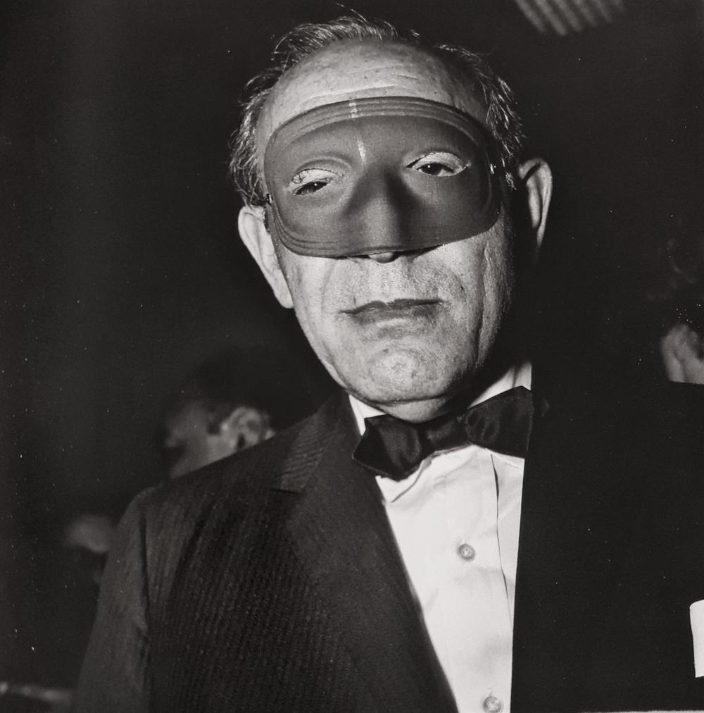 Artwork by Diane Arbus, MASKED MAN AT A BALL, Made of Photo Engraving Photogravure